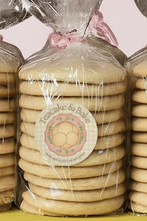 Stacks of cookies in clear packaging with 'Teacake & Bake' labels.